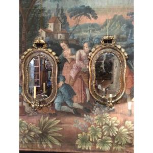 Pair Of Italian Mirrors In Carved Wood 18th With Their Arm Of Light And Their Silvering