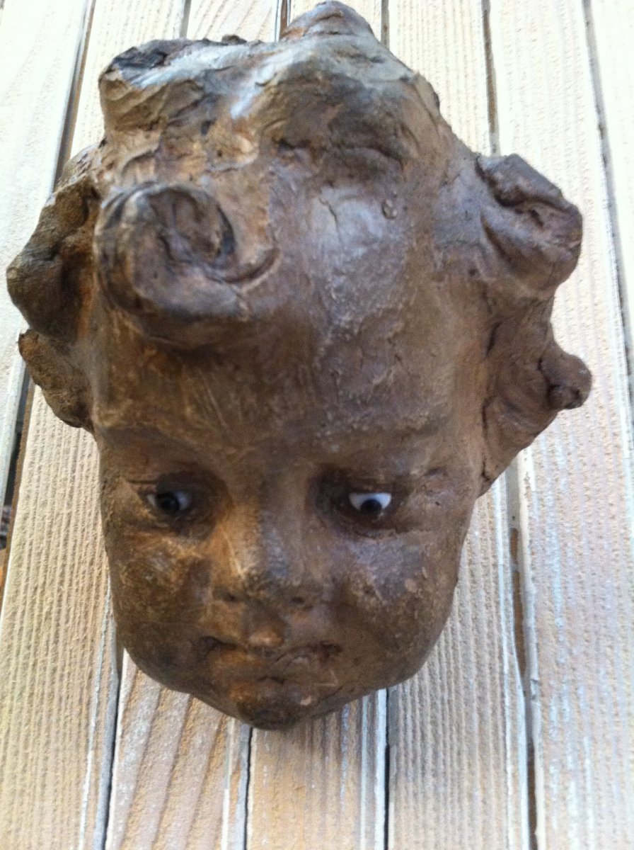 Head Of Cherub XIX Th In Terracotta