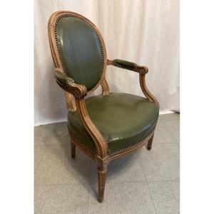Fauteuil médaillon en cuir