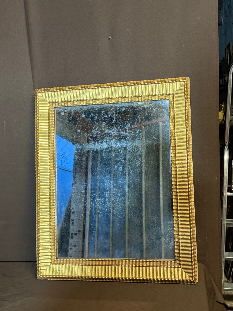 Miroir à godron XIXe en bois doré 