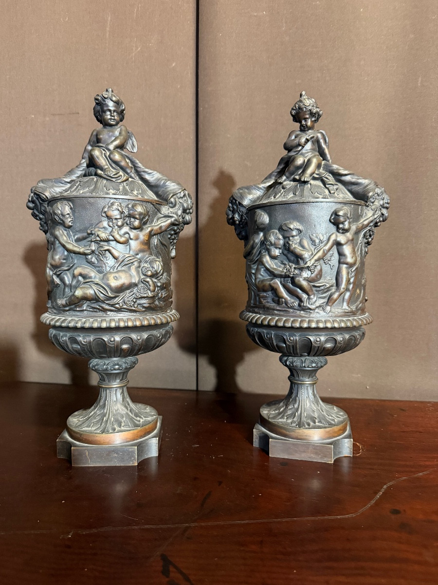 Pair Of Bronze Cassolettes Decorated With Cherubs