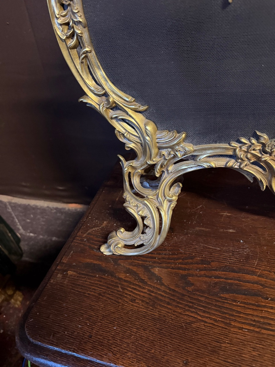 Pare étincelle en bronze doré à décor de chérubins -photo-4