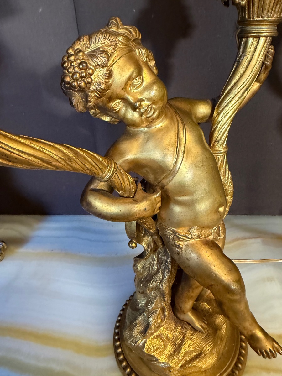 Paire de candélabres en bronze à décor de bacchus -photo-2