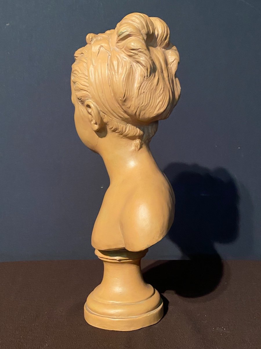 Bust Of Young Boy In Terracotta-photo-1