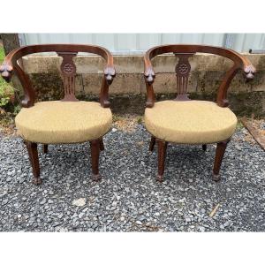 Paire de fauteuils à têtes de lions 
