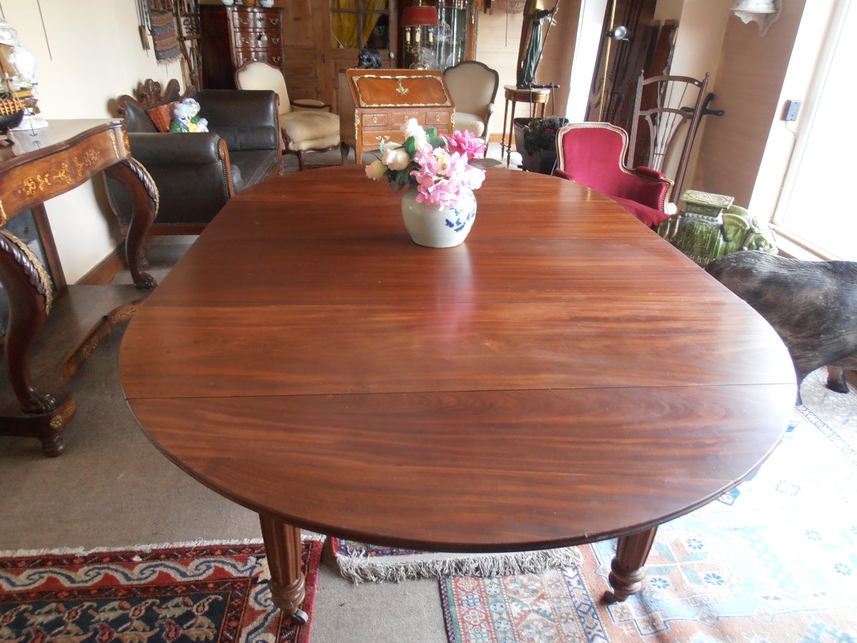 TABLE HUIT  PIEDS EN ACAJOU