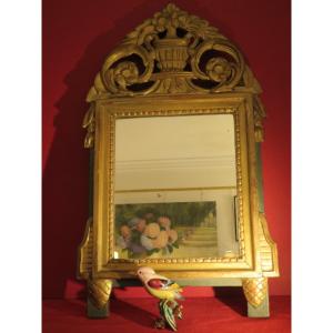 Petit miroir en bois doré , glace au mercure de style Louis XVI 