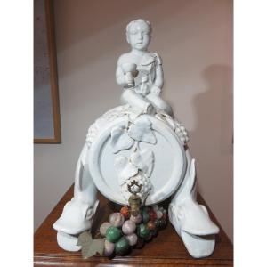 Glazed White Ceramic Wine Fountain: Bacchus Riding A Barrel Late 19th Century 
