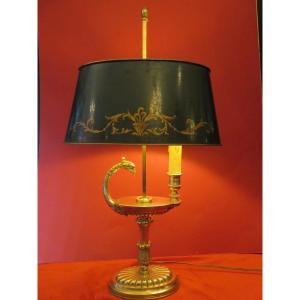 Lampe bouillotte en bronze doré à tête de griffon XXème