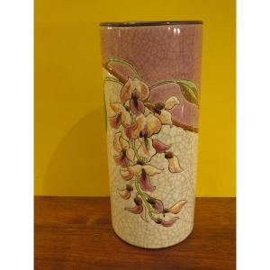 Vase rouleau en émaux polychrome de Longwy , décor de fleurs , hauteur 20 cm parfait état 