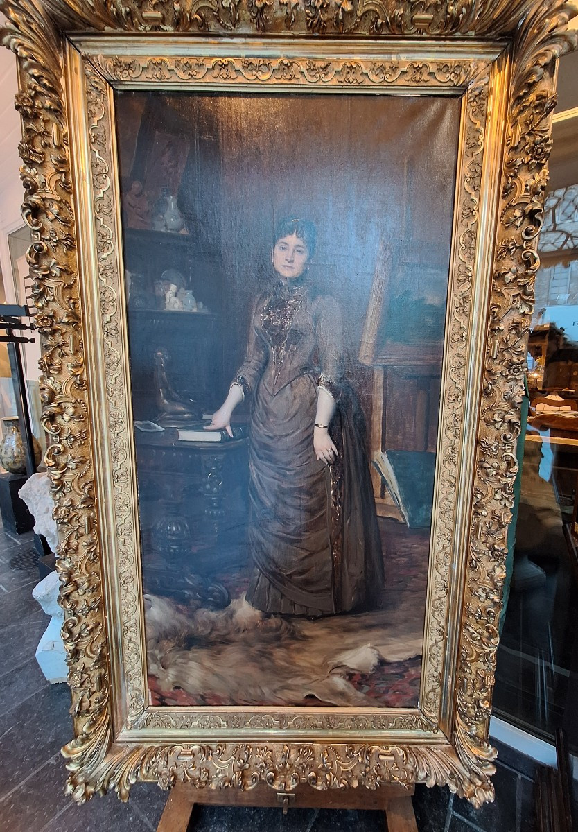 Oil On Canvas Signed Leon Herbo Depicting An Elegant Woman In An Interior 