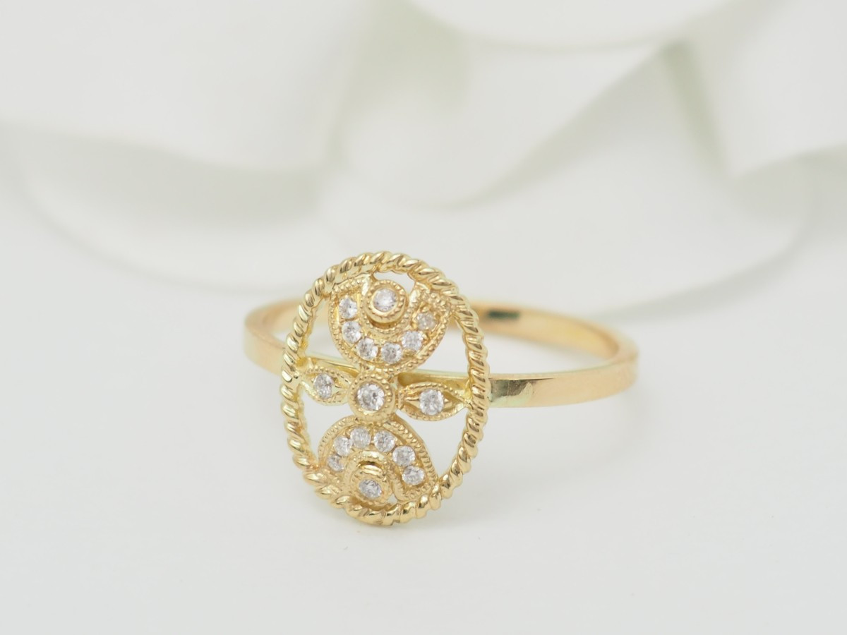 Bague ajourée en or jaune et diamants-photo-3