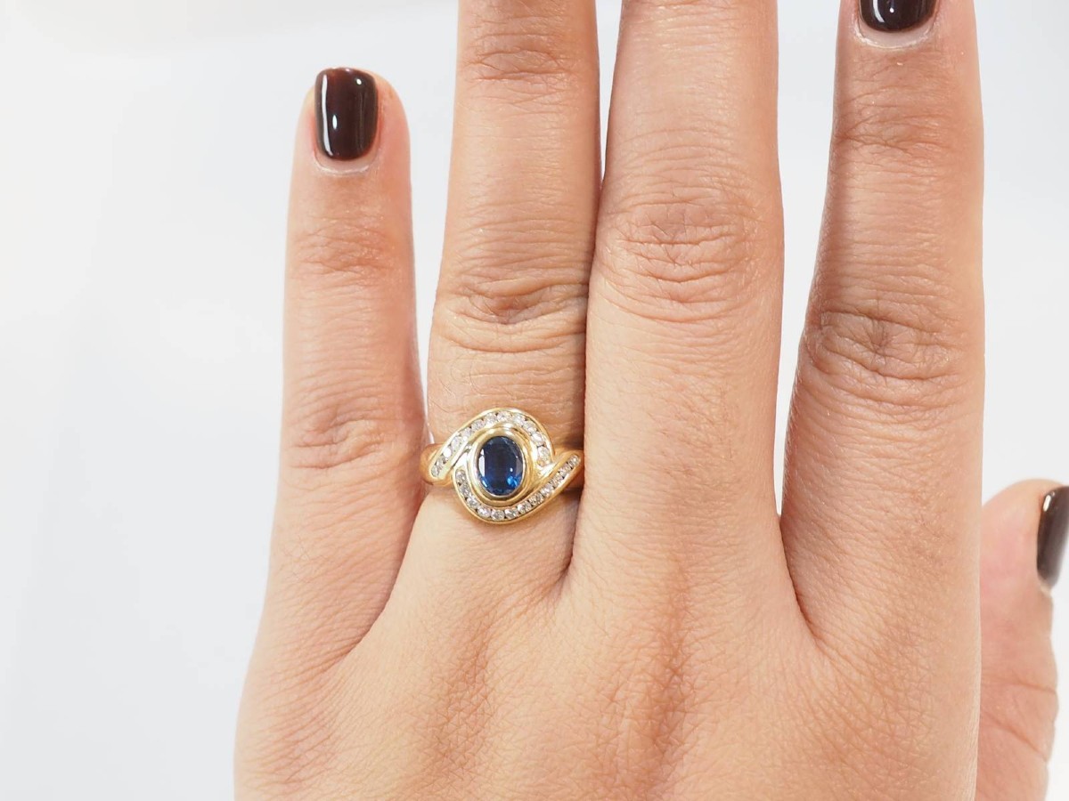 Yellow Gold Swirl Ring With Oval Sapphire And Diamonds-photo-3