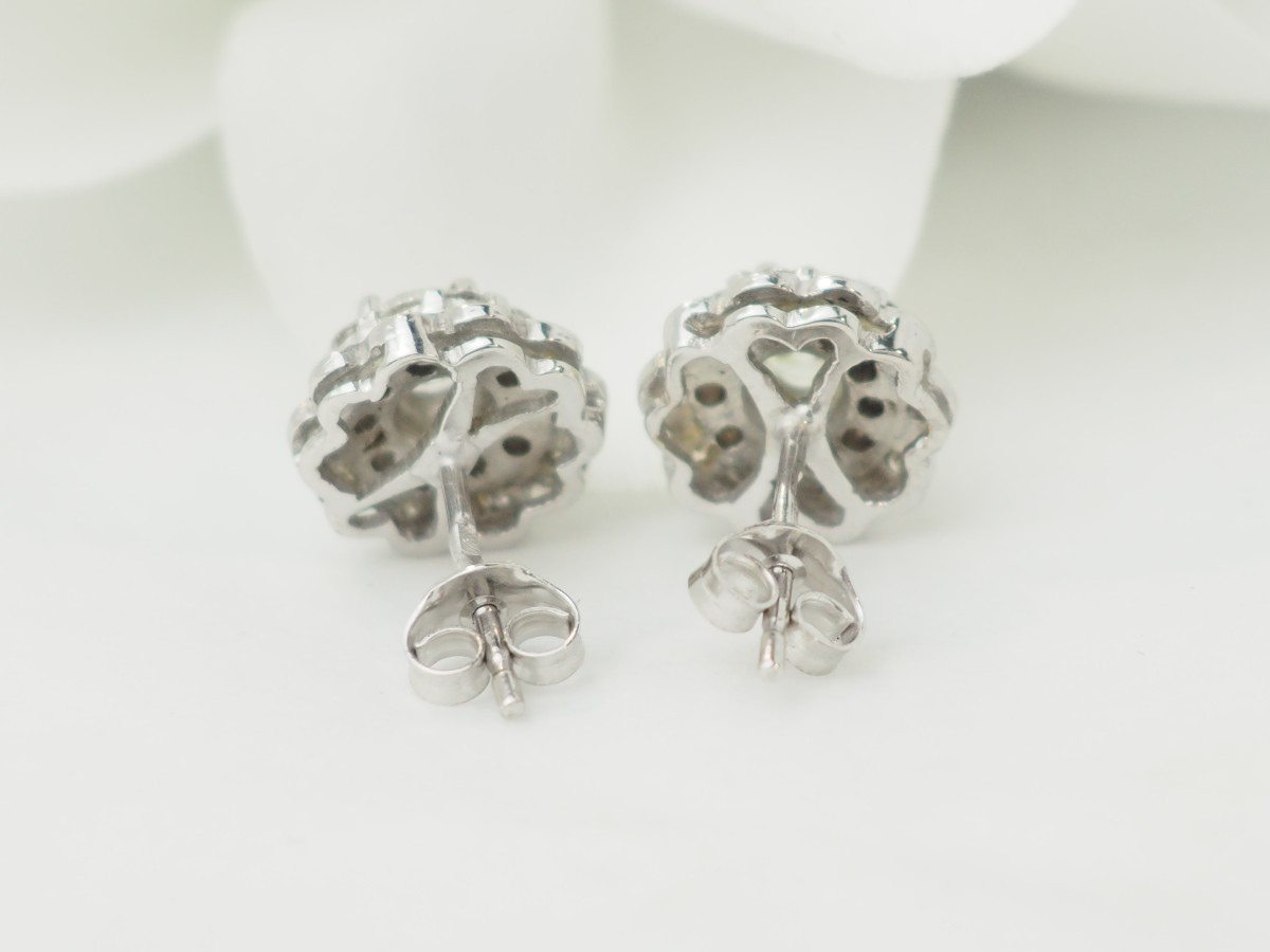Puces d'oreilles en or blanc et diamants-photo-4