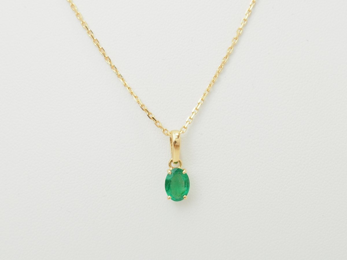 0.65 Carat Natural Emerald  In Yellow Gold