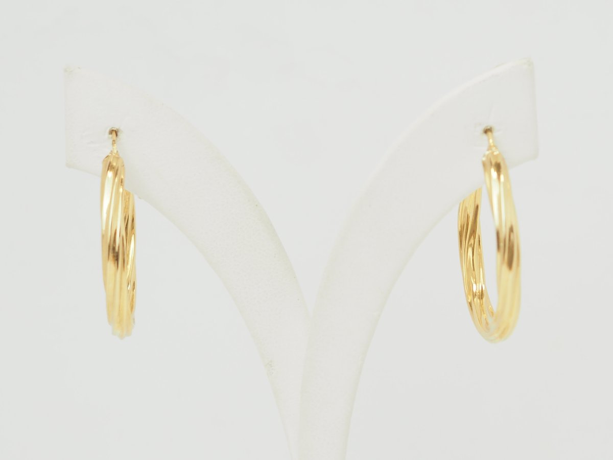 Créoles torsadées en or jaune 18 carats diamètre 30 mm-photo-4