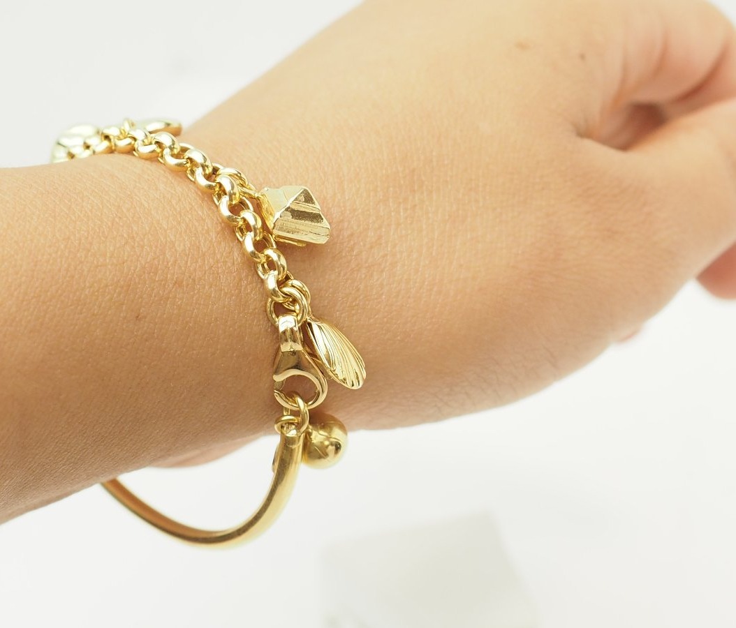 18-karat Yellow Gold Charm Bracelet – Heart, Seashell, And Pearl Charms-photo-1