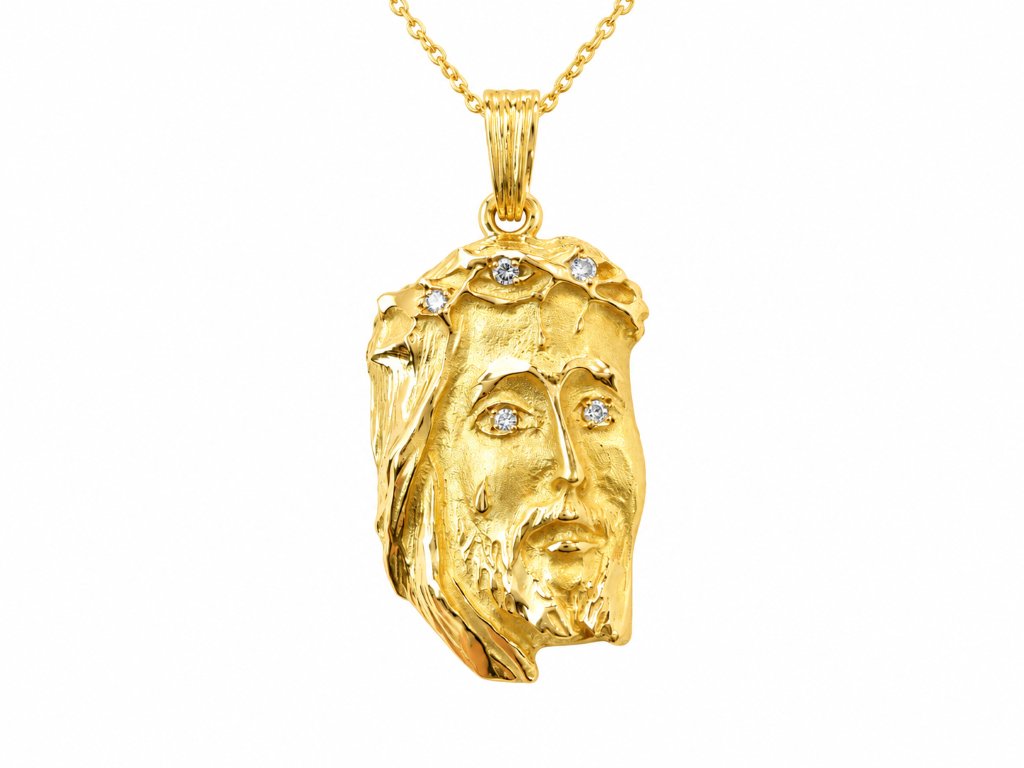 Pendentif Tête du Christ en or jaune 18 carats et diamants 0,10 ct