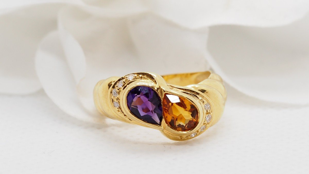 Yellow Gold Ring Set With An Amethyst And A Citrine