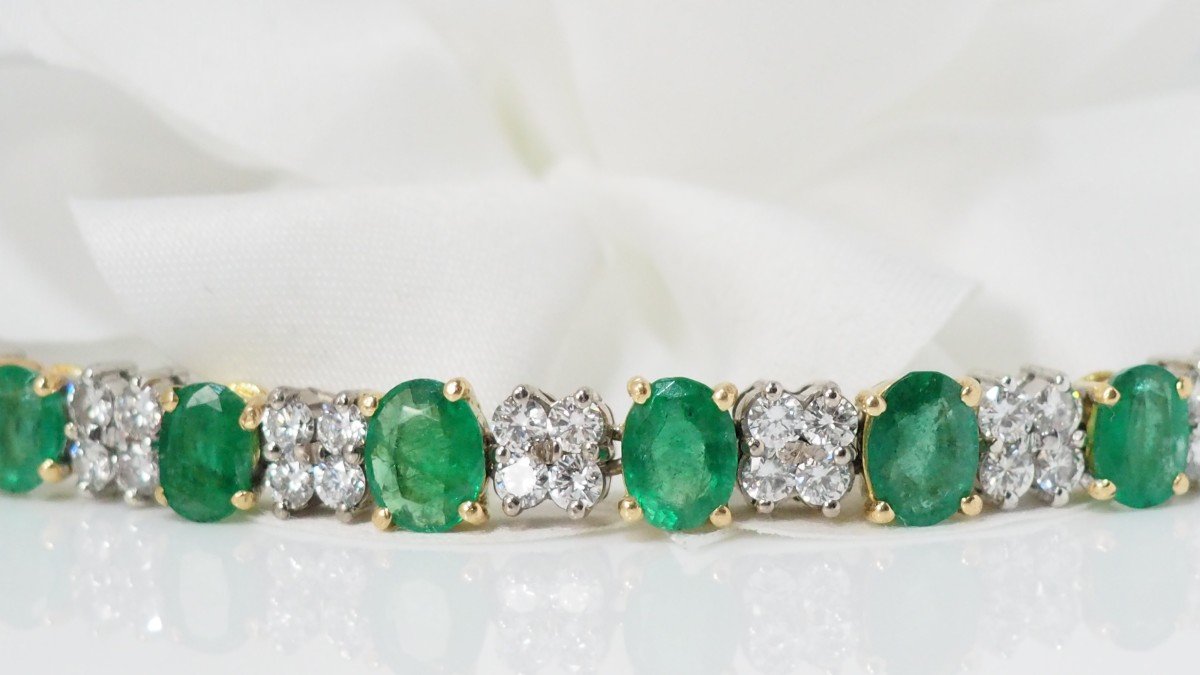 Rivière Bracelet In White And Yellow Gold, Oval Emeralds And Diamonds
