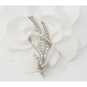 Broche vintage en or blanc et diamants