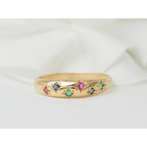 Bague jonc en or rose et pierres précieuses