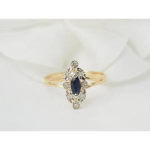 Bague marquise en or jaune, saphir et diamants