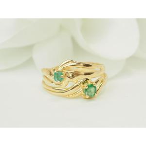Bague vintage en or jaune 18 carats sertie de deux émeraudes naturelles