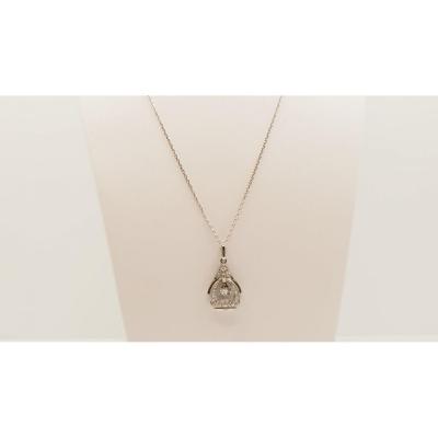 Art Deco Pendant In Platinum, White Gold And Diamonds