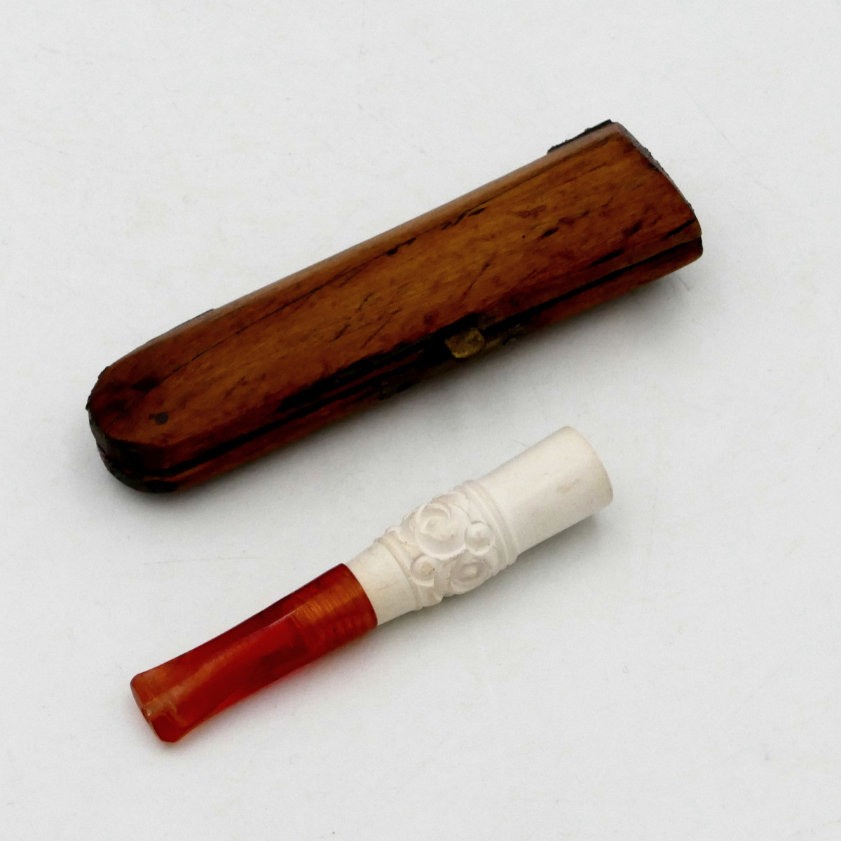 Bakelite And Sculpted Meerschaum Cigarette Holder, In A Case, Early 20th Century.