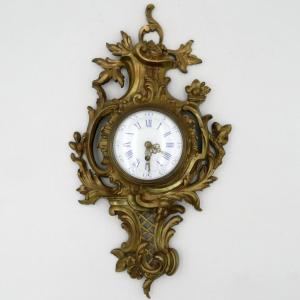 Cartel d'applique en bronze de style Louis XV, époque XIXe siècle.