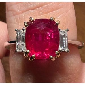 Natural Ruby Ring Surrounded By Diamonds In 18 Carat White Gold