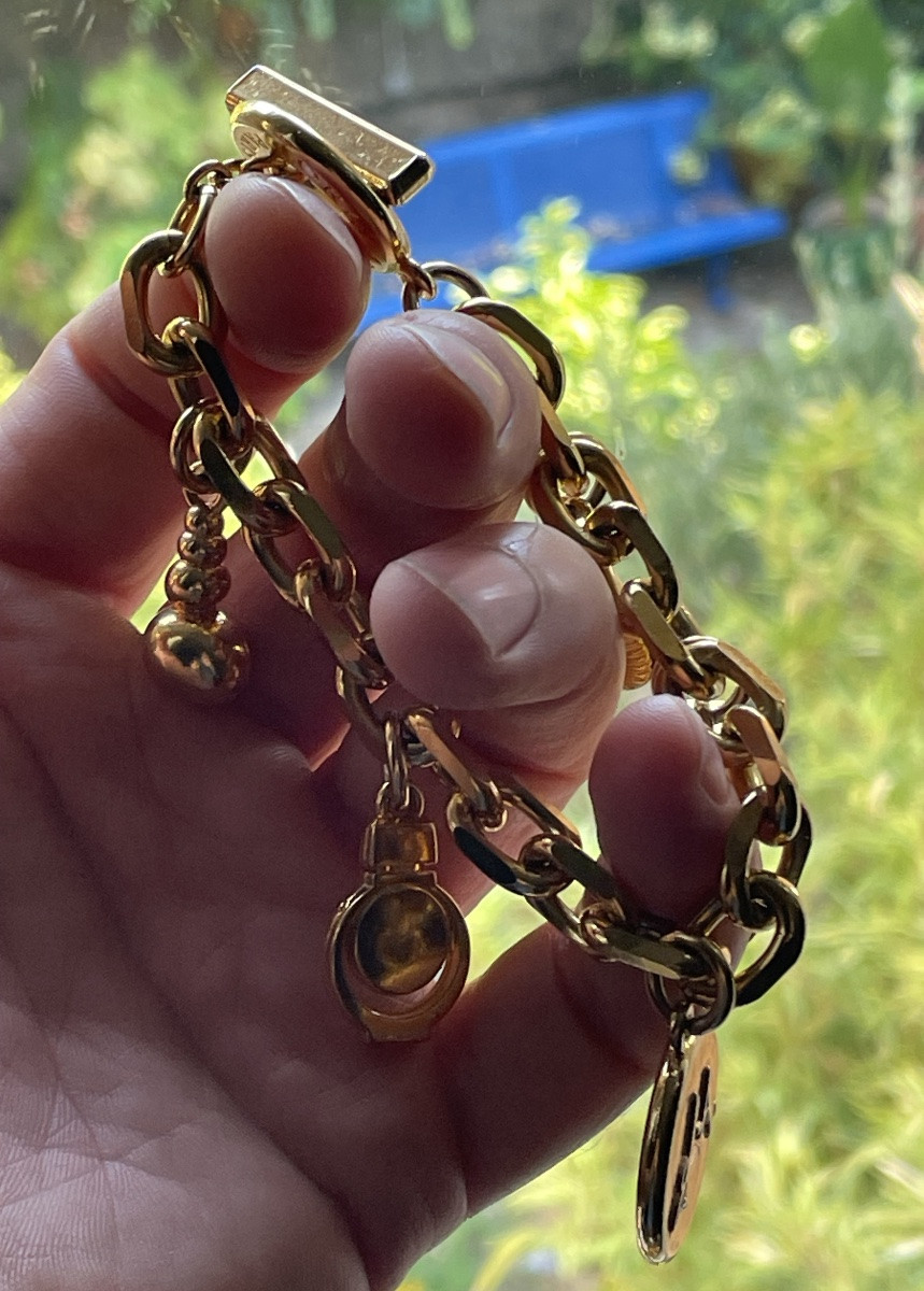 BRACELET  BRELOQUES COUTURE DE LA MAISON LORIS AZZARO EN MÉTAL DORÉ  GOURMETTE MAILLES FORÇAT-photo-1