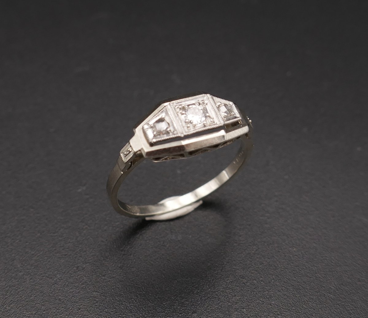 Art Deco Ring Set With A Diamond Flanked By Rose-cut Diamonds, In Gold And Platinum.