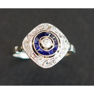 Art Deco Diamonds And Calibrated Sapphires Ring.