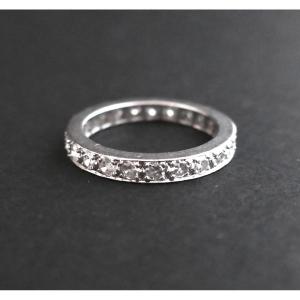 Small Platinum And Diamond Wedding Ring.