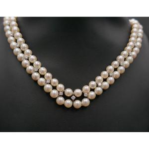 Collier double rang de perles et diamants 1,70 carat.