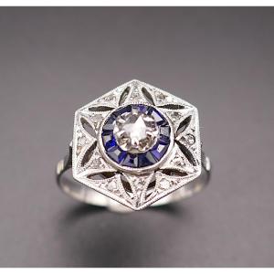 Art Deco Ring With Diamonds And Calibrated Sapphires.