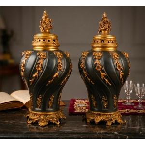  Paire de cassolettes d'époque Empire en bronze patiné et doré, vers 1810 ​