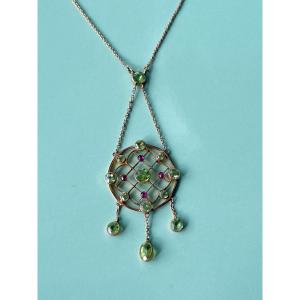 A 9-karat Gold Necklace In The Victorian And Art Nouveau Styles, Set With Peridots.