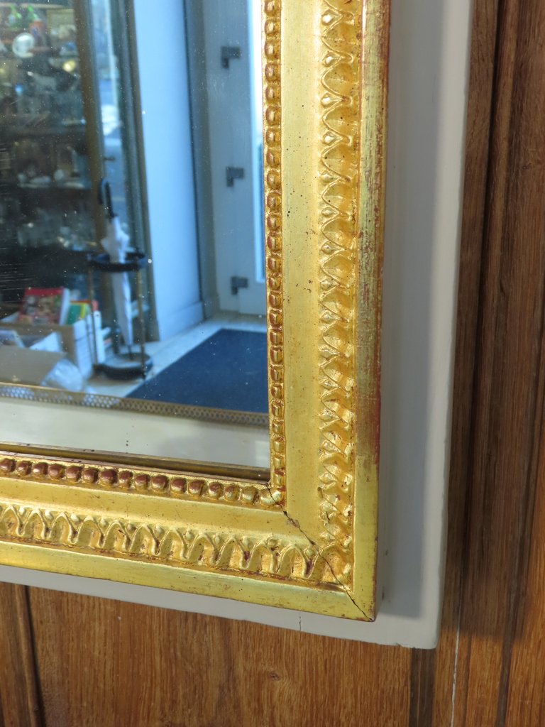 MIROIR DE BOISERIE EN BOIS DORE ET LAQUE Epoque Louis XVI -photo-1