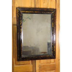 MIROIR A MOULURES D’ECAILLE Epoque début XVIII ème