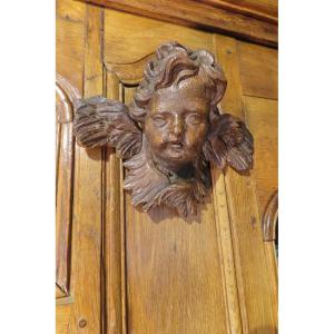 PAIRE DE PETITES TETES D’ANGES EN BOIS SCULPTE Epoque fin XVIII ème Siècle.