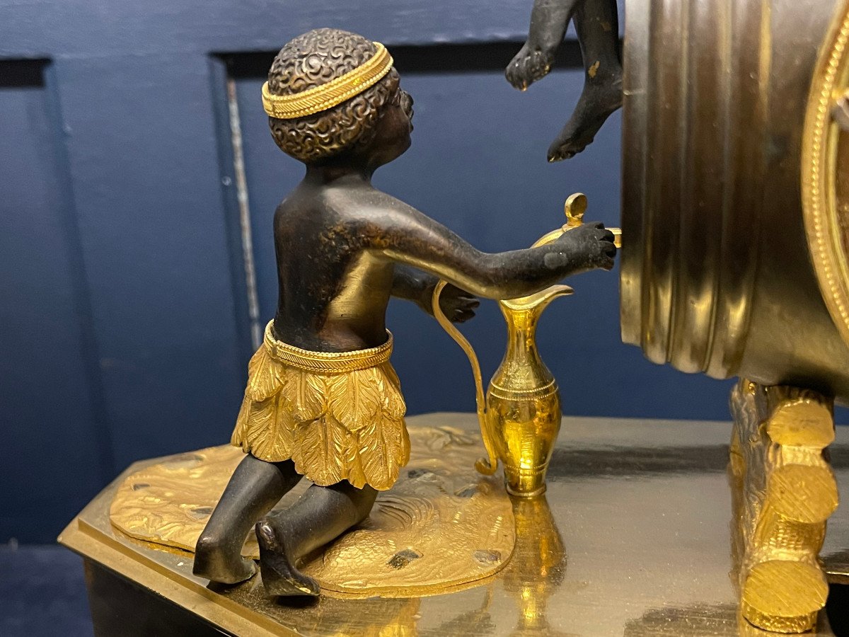 Pendule Aux Petits Africains Soutirant Le Vin-photo-6