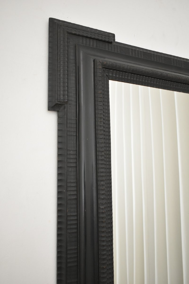 Miroir en bois ébénisé sculpté, XIXe siècle.-photo-3