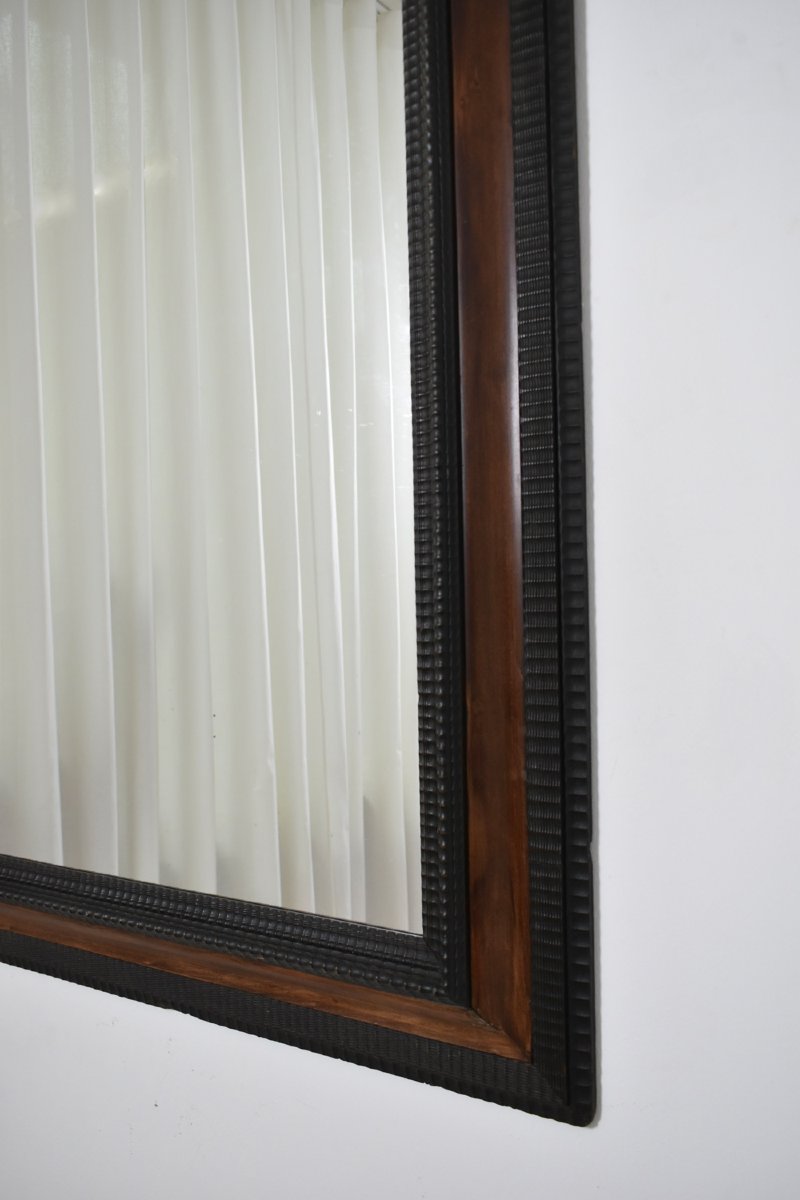 Miroir en bois ébénisé sculpté et écaille de tortue en trompe-l'œil, XIXe siècle.-photo-2