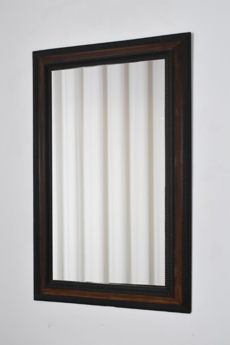 Miroir en bois ébénisé sculpté et écaille de tortue en trompe-l'œil, XIXe siècle.-photo-4