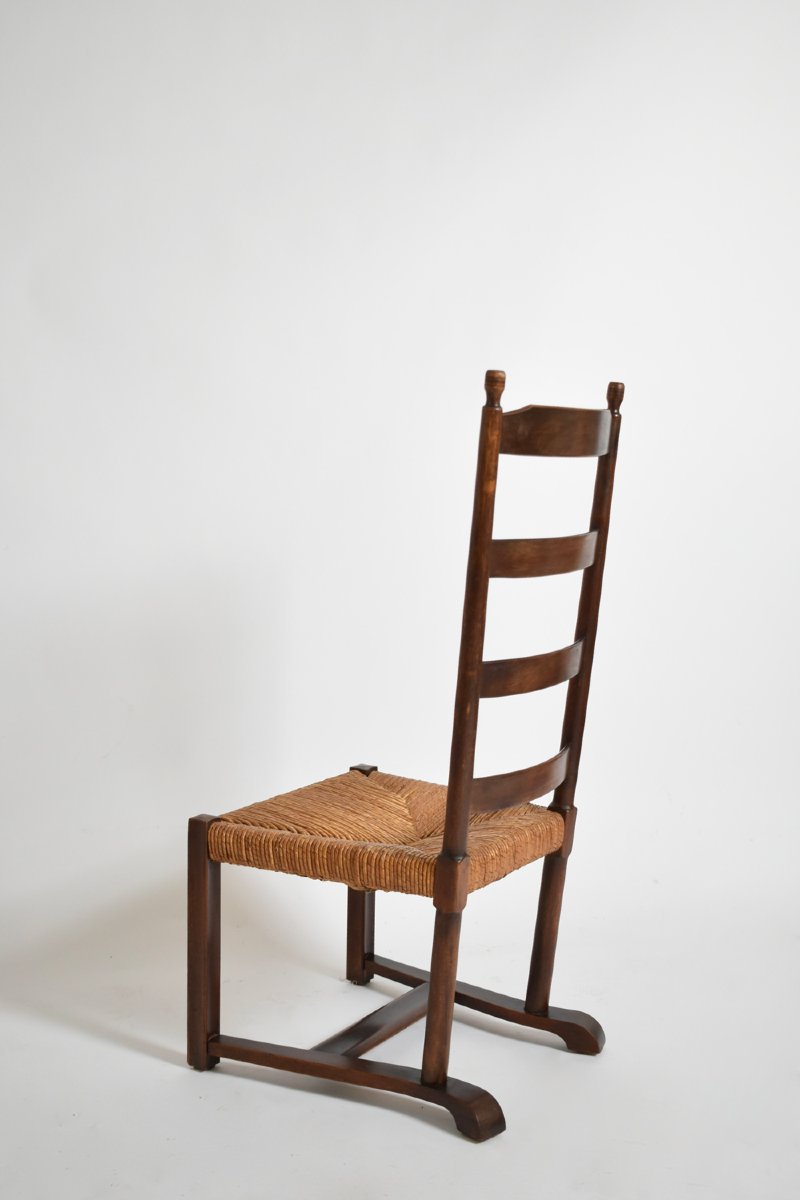 Fauteuil bas en bois et paille, années 1950.-photo-2