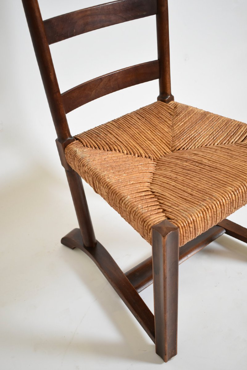 Fauteuil bas en bois et paille, années 1950.-photo-3