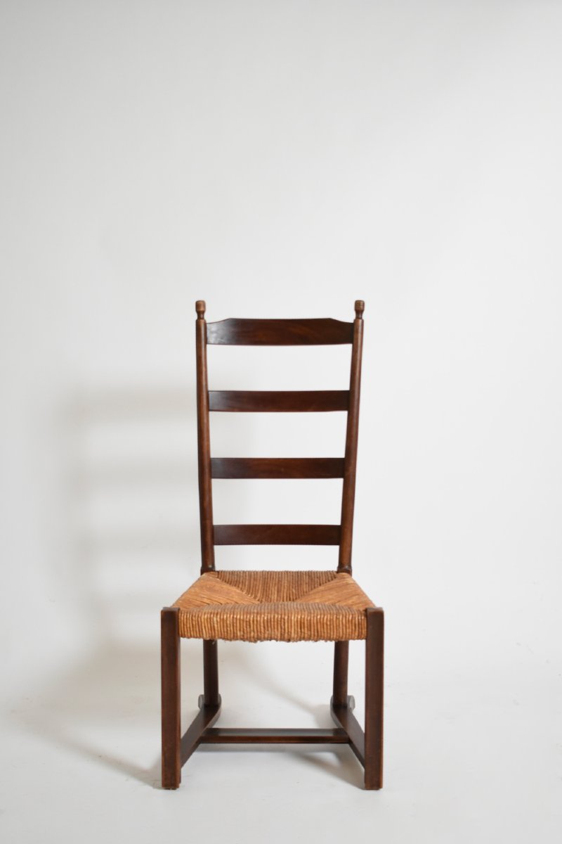 Fauteuil bas en bois et paille, années 1950.-photo-4